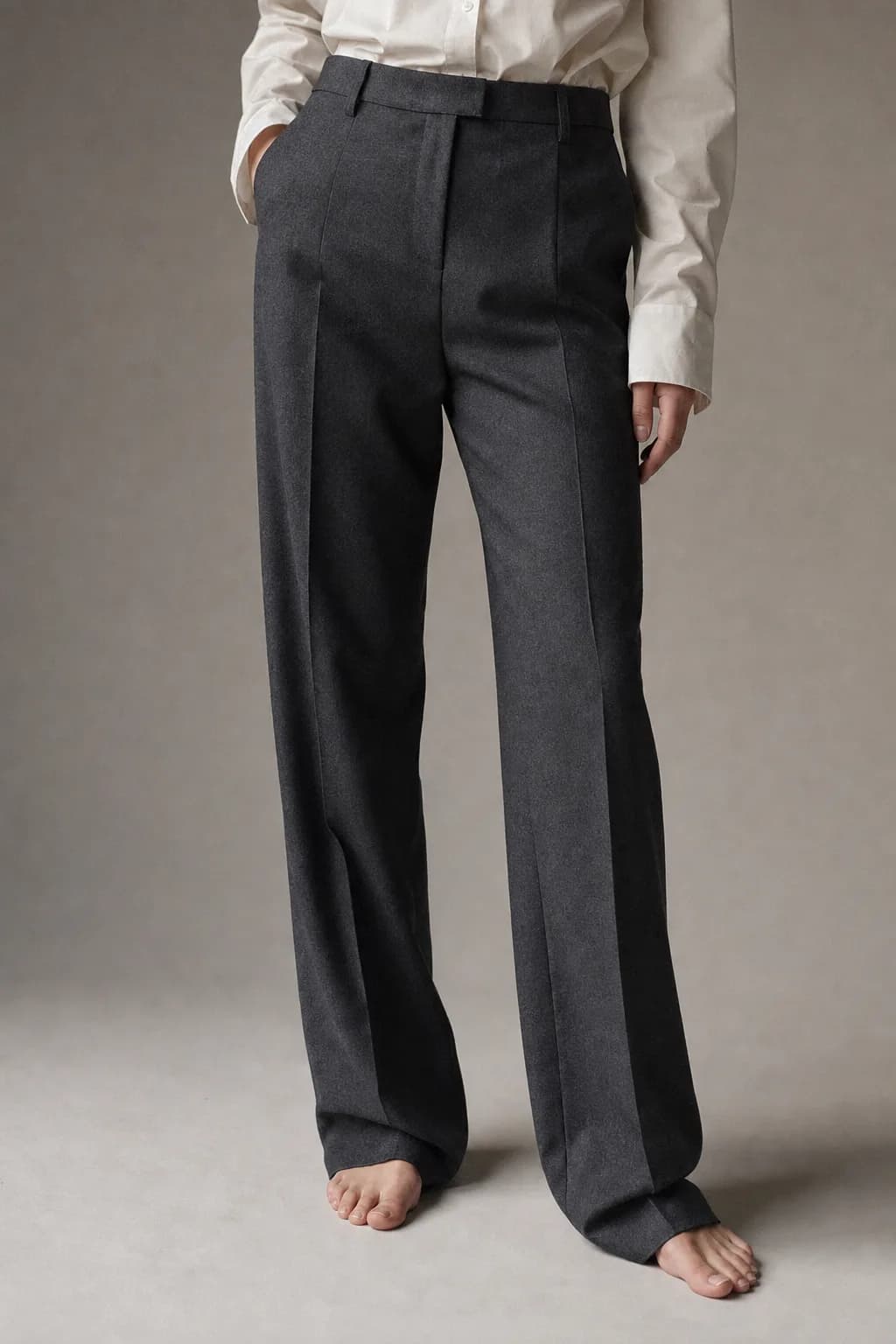Graphite recycled-wool marta trousers with a wide pressed leg, cropped waist to bare feet